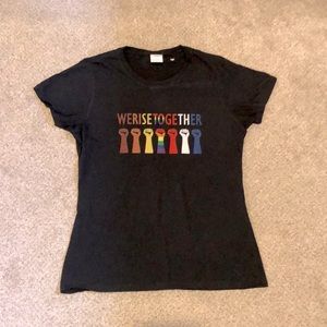 Black “We Rise Together” graphic tee